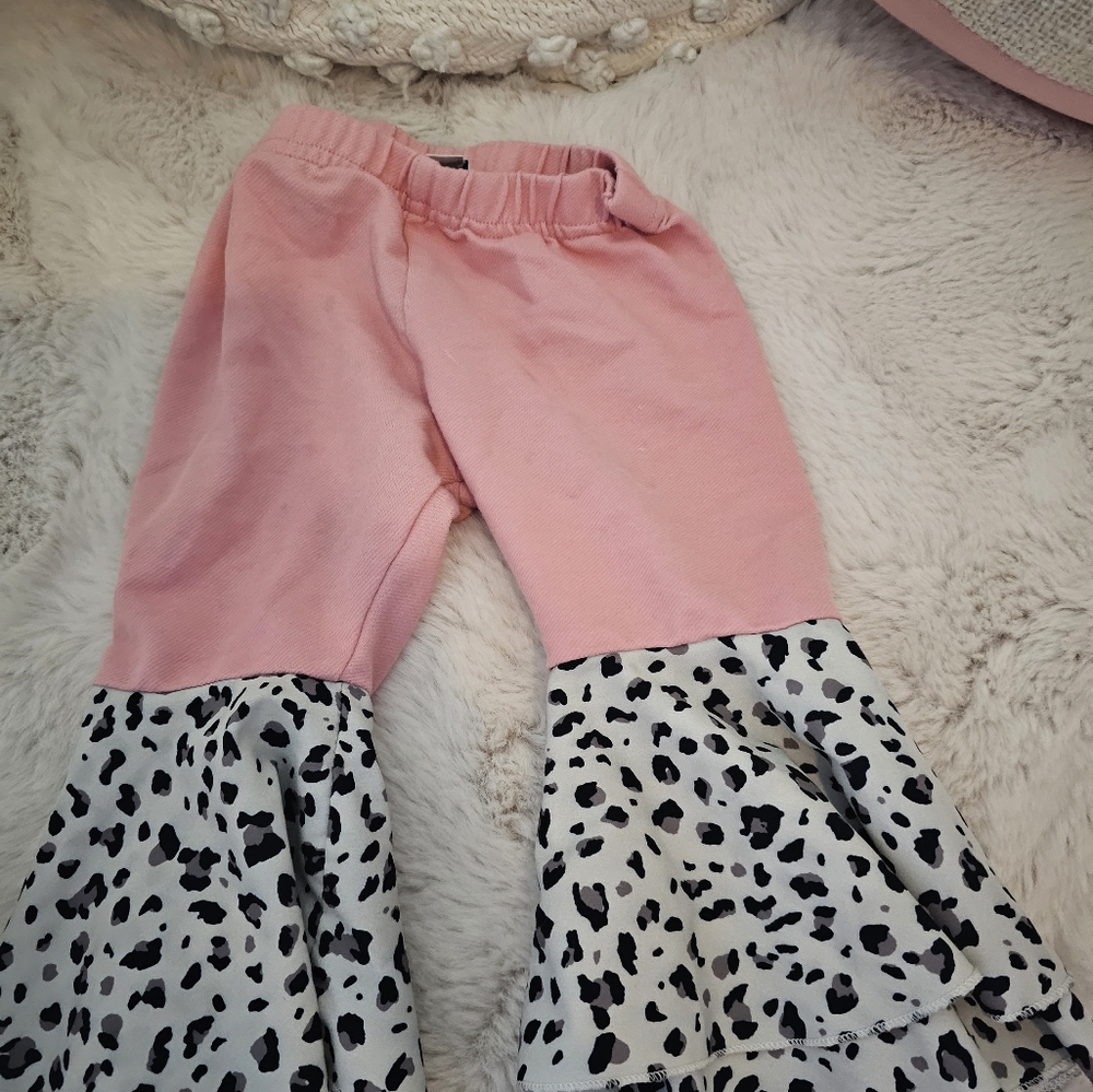 12-18 month Bailey's Blossom bell bottoms, pink and snow leopard color